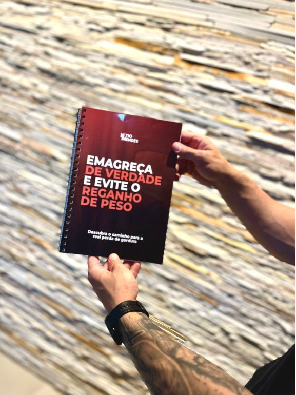 Exemplar impresso do ebook Emagreça de Verdade e Evite o Reganho de Peso, de capa vinho